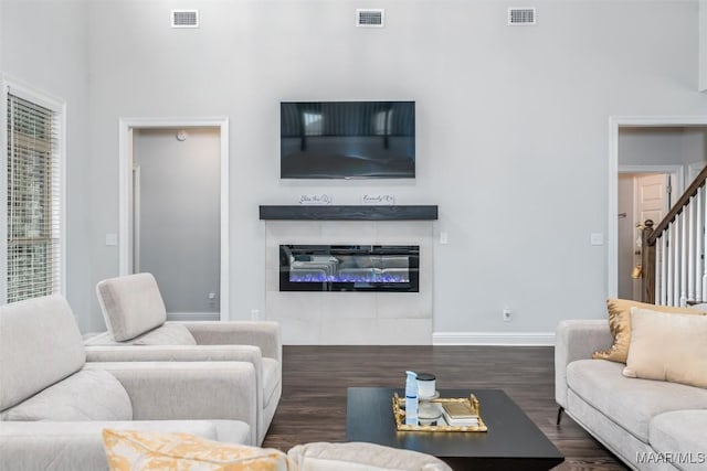 living room featuring dark hardwood / wood-style floors