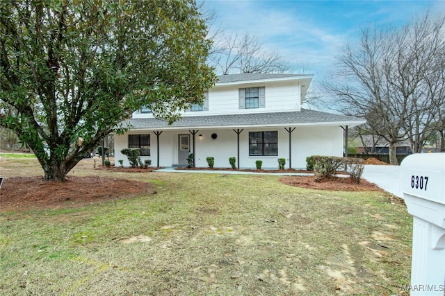 view of front of property with a porch and a front yard