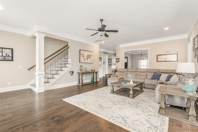 living room with ceiling fan, ornate columns, dark wood-type flooring, and crown molding