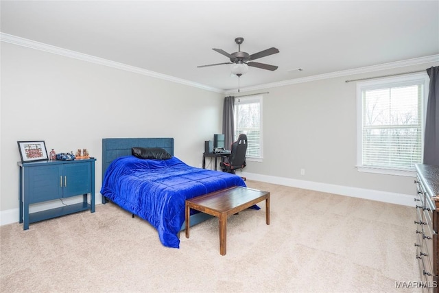 carpeted bedroom featuring ceiling fan and ornamental molding