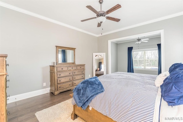 bedroom featuring ceiling fan, dark wood-type flooring, and ornamental molding