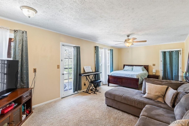 bedroom with ceiling fan, access to outside, a textured ceiling, and light colored carpet