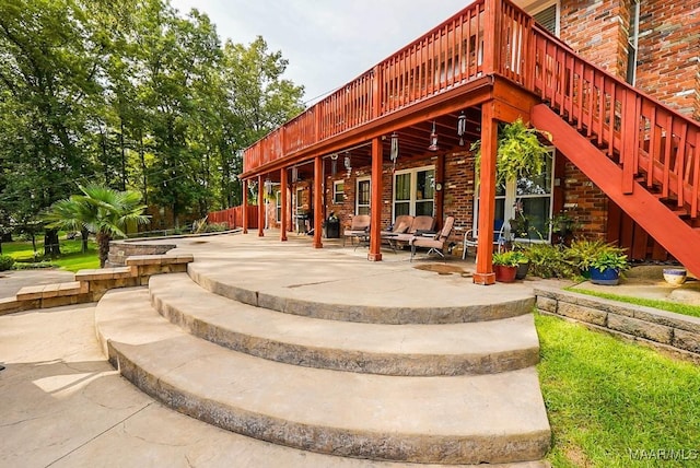 view of patio featuring a wooden deck