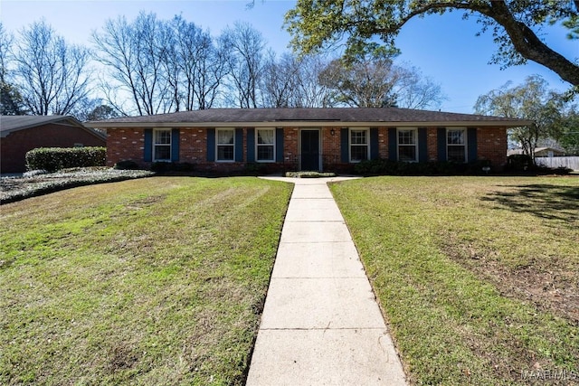 ranch-style house with a front yard