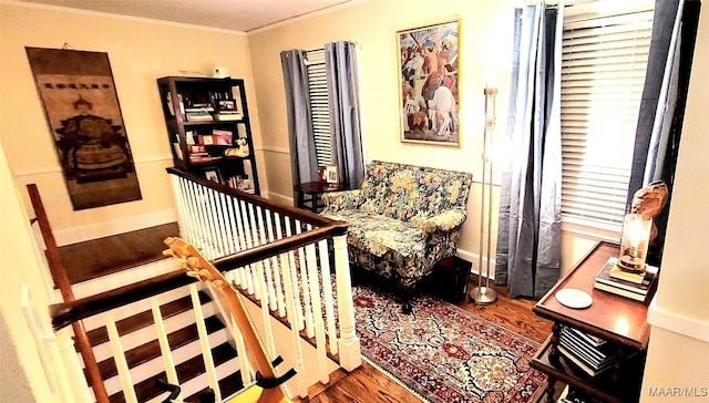 bedroom featuring crown molding and wood-type flooring