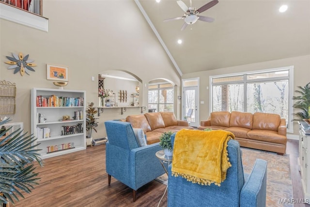 living room with high vaulted ceiling, ceiling fan, and wood-type flooring