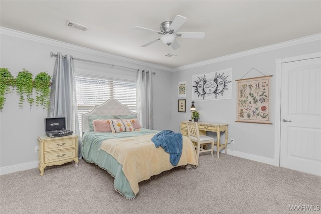 carpeted bedroom with ceiling fan and crown molding