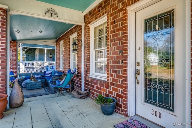 entrance to property with a porch