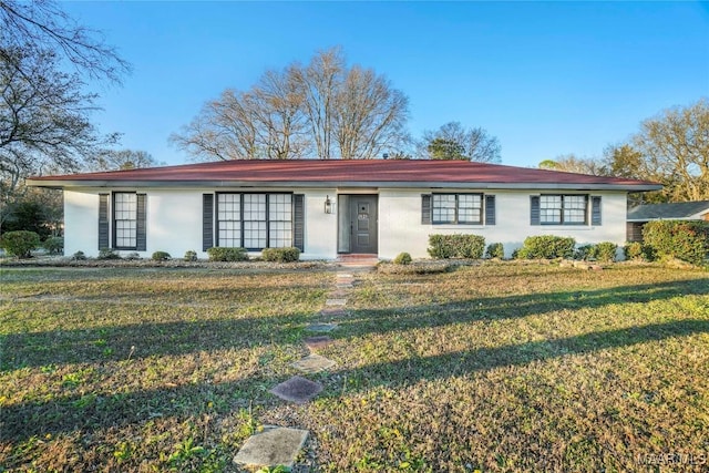 single story home with a front yard