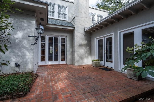 view of patio featuring french doors