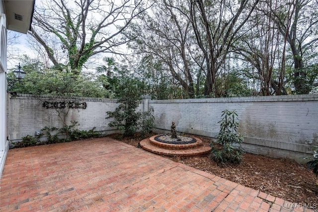 view of patio with a fenced backyard