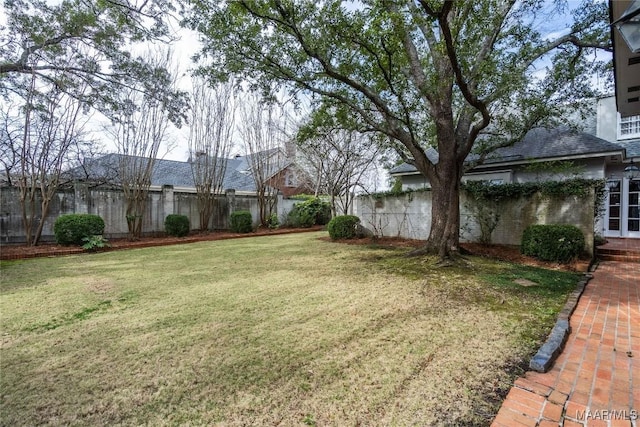 view of yard featuring fence