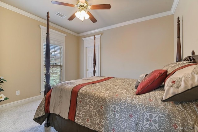 carpeted bedroom featuring crown molding, baseboards, and a ceiling fan
