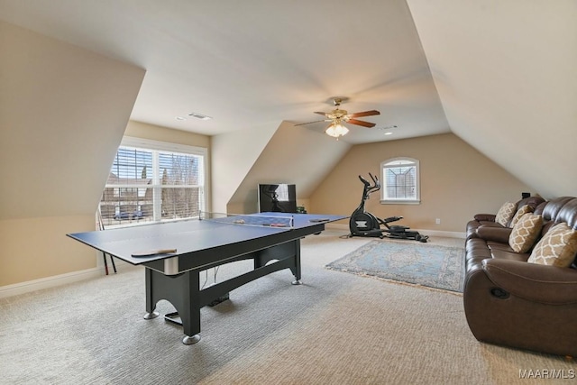game room featuring vaulted ceiling, a ceiling fan, carpet, and baseboards