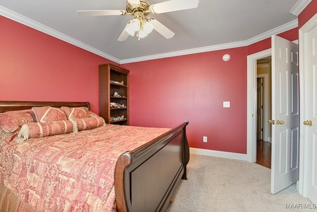 bedroom featuring light carpet, crown molding, a ceiling fan, and baseboards