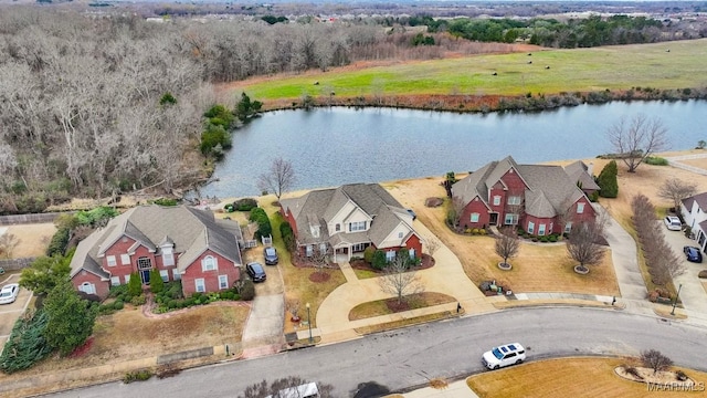 aerial view featuring a residential view and a water view