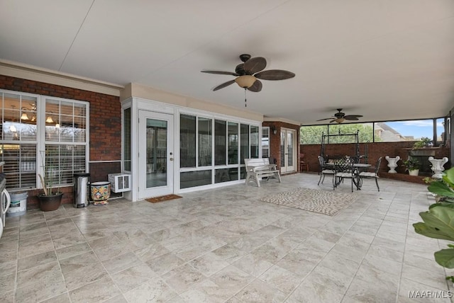 view of patio / terrace featuring ceiling fan, outdoor dining area, french doors, and fence