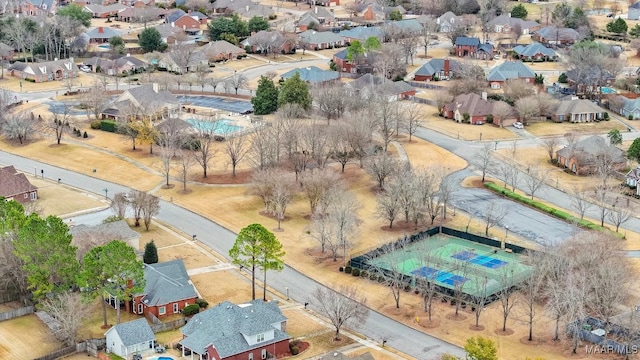 aerial perspective of suburban area with a pool area