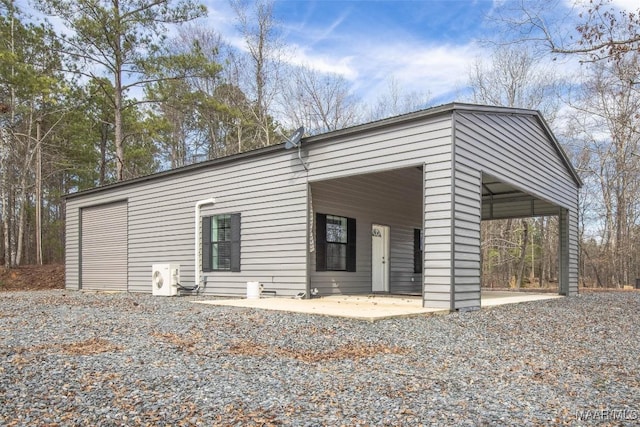 view of front of home with ac unit