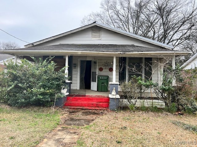 bungalow-style home with a porch