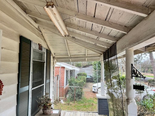 view of patio featuring fence