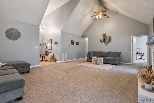 living room with high vaulted ceiling, light carpet, beamed ceiling, and visible vents