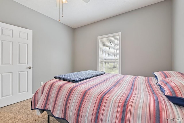 bedroom featuring carpet flooring and ceiling fan