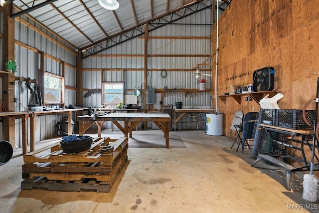 interior space with a workshop area and metal wall