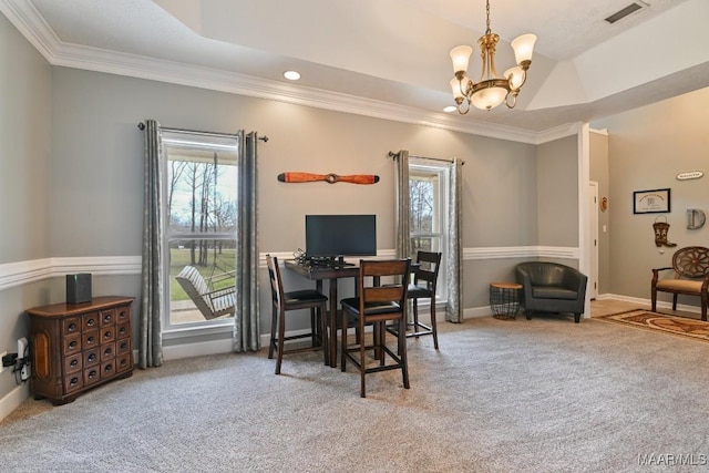 dining room featuring light carpet, visible vents, a raised ceiling, ornamental molding, and a chandelier