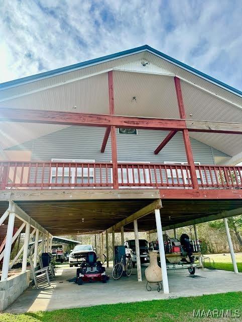 view of parking with a carport