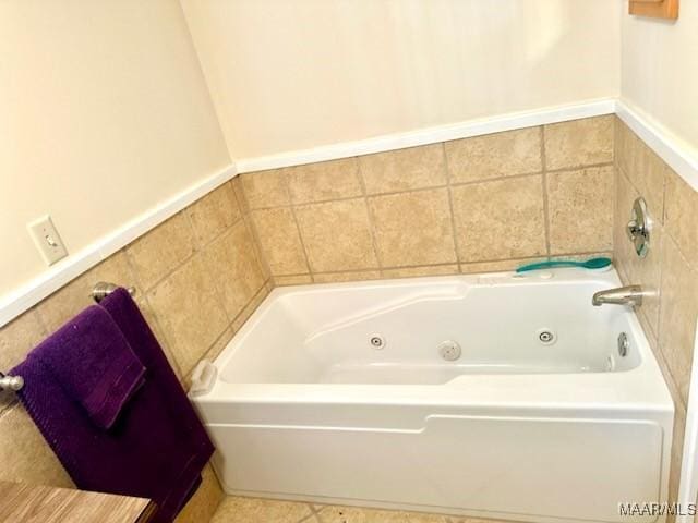 full bath with a jetted tub