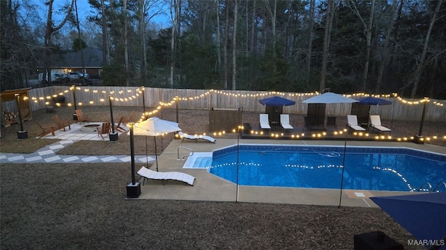 view of pool with a fenced backyard and a fenced in pool