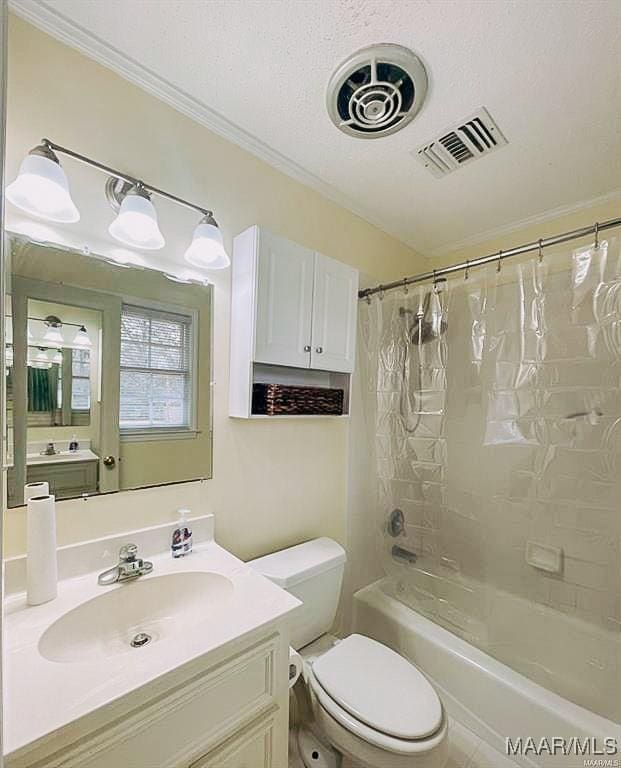 full bath featuring a textured ceiling, toilet, vanity, visible vents, and shower / bath combo with shower curtain