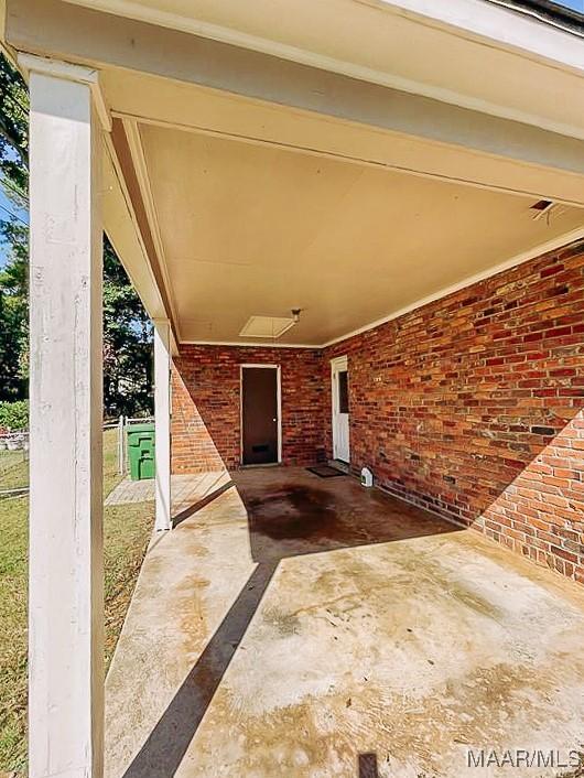 view of patio / terrace featuring a carport