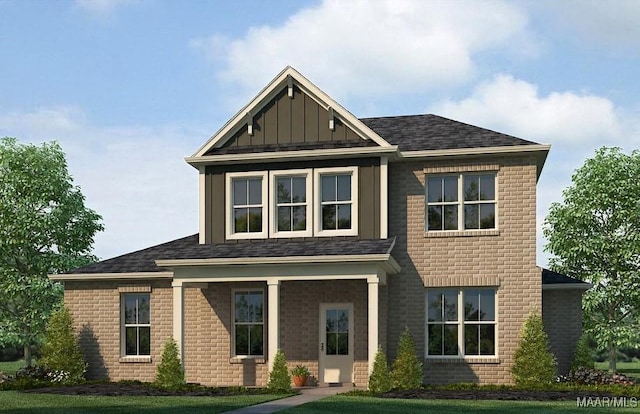 craftsman house featuring a front yard, board and batten siding, and brick siding