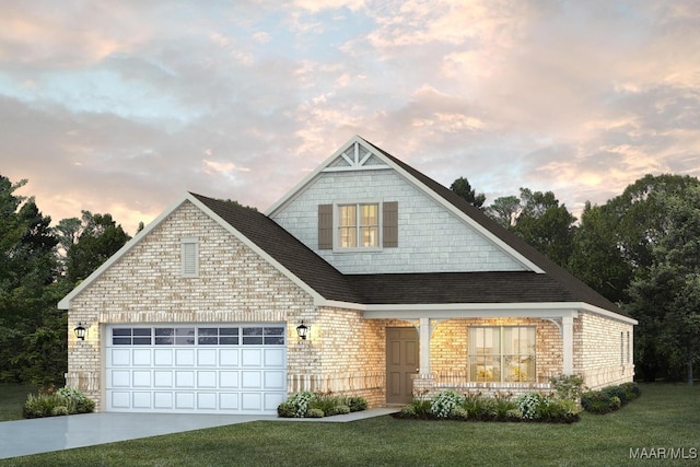 view of front of home with brick siding, a shingled roof, a lawn, a garage, and driveway