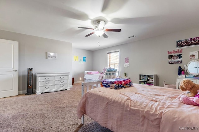 bedroom with a ceiling fan, carpet flooring, baseboards, and visible vents