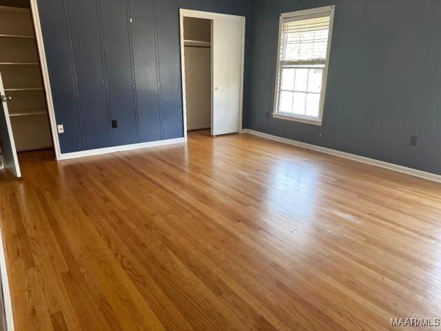 3110 Highfield Dr, Montgomery, AL 36111 - unfurnished bedroom featuring light wood finished floors and baseboards