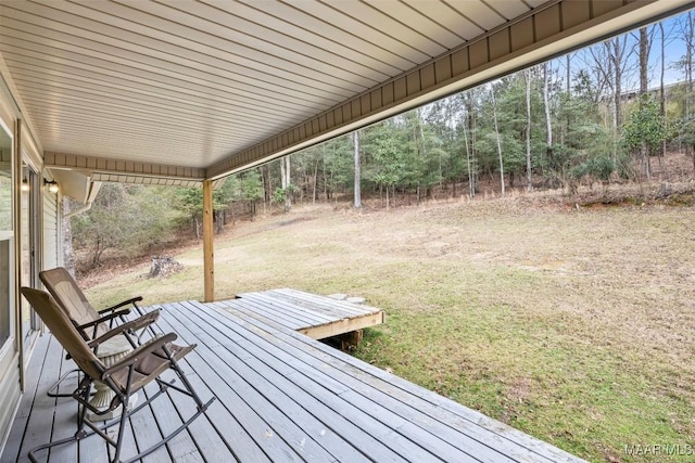 wooden deck with a yard