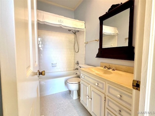 bathroom with shower / bathtub combination, toilet, ornamental molding, vanity, and tile patterned flooring