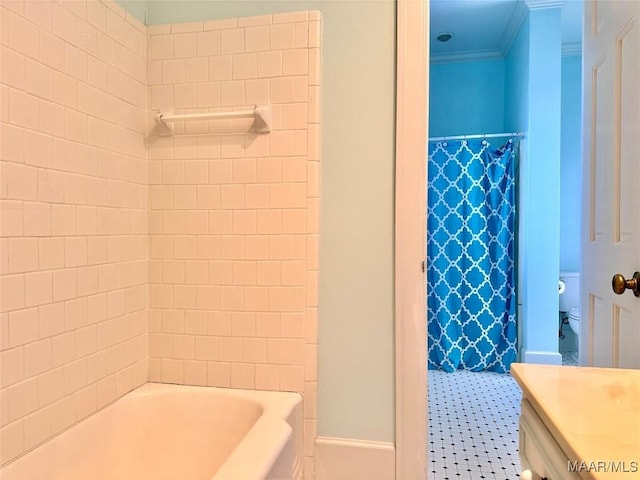 full bathroom with baseboards, toilet, vanity, and crown molding