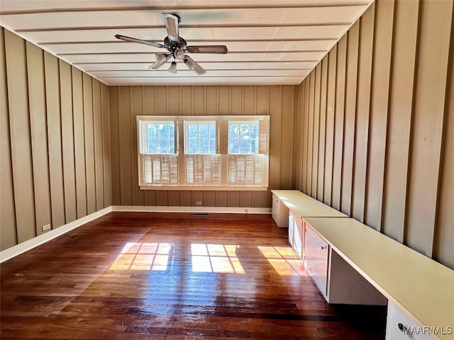 view of sauna featuring baseboards and wood finished floors