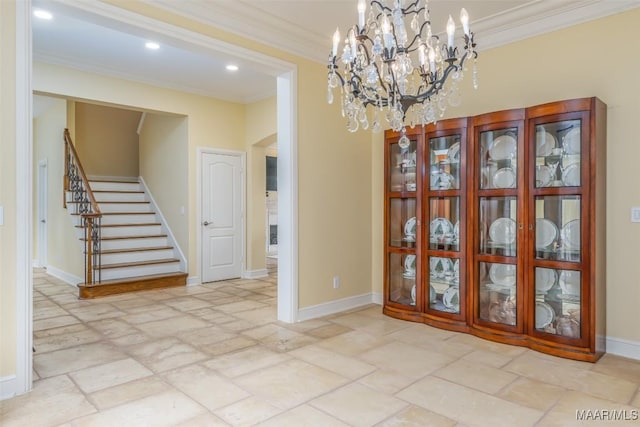 unfurnished dining area featuring baseboards, ornamental molding, and stone tile floors