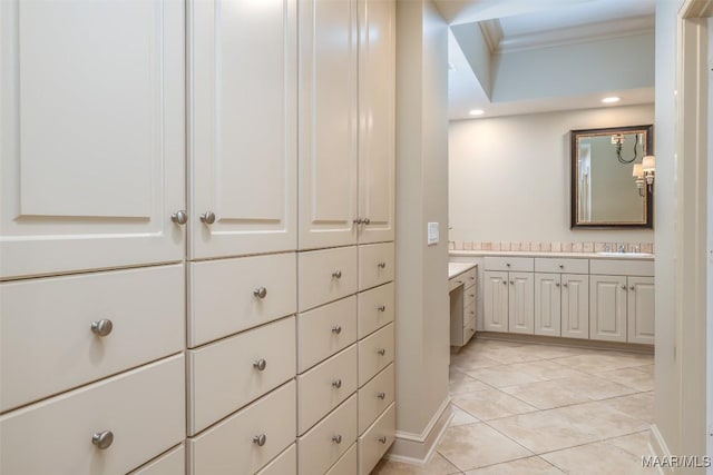 bathroom featuring recessed lighting, tile patterned floors, vanity, and crown molding