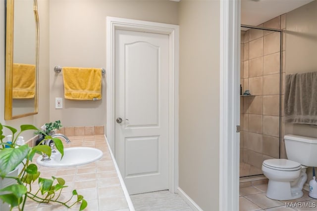 full bathroom featuring toilet, tile patterned flooring, a shower stall, and vanity