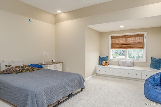 bedroom featuring recessed lighting, light carpet, and baseboards