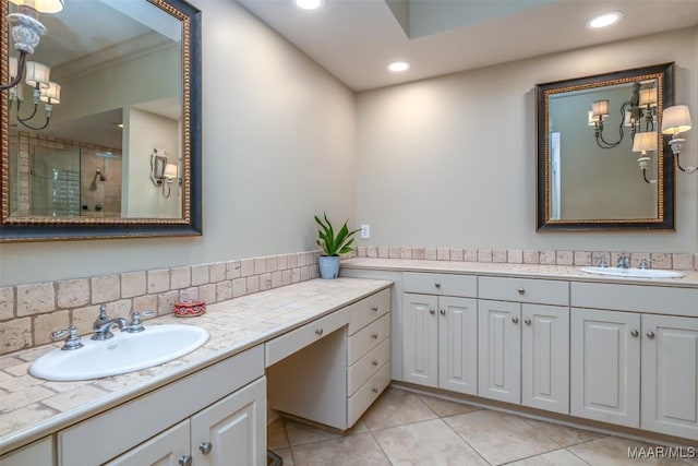 bathroom with tile patterned flooring, a shower stall, vanity, and recessed lighting