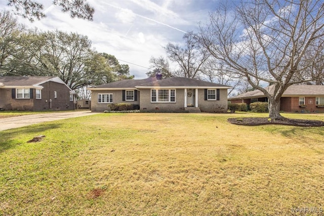 ranch-style house with a front yard, crawl space, brick siding, and a chimney