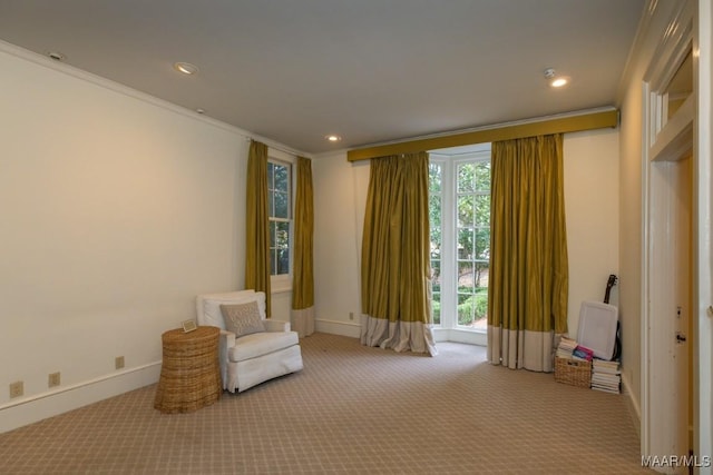 unfurnished room with carpet floors, recessed lighting, crown molding, and baseboards