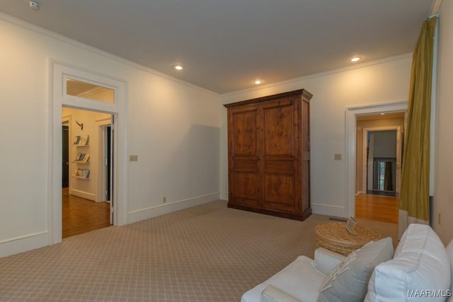 living room with recessed lighting, light colored carpet, and crown molding